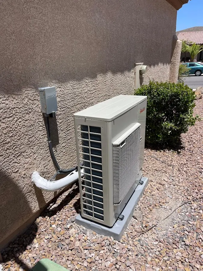 Residential air conditioning condenser unit in North College Hill